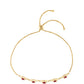Goldplattiertes Silberarmband mit Thai Rubin und weißem Topas