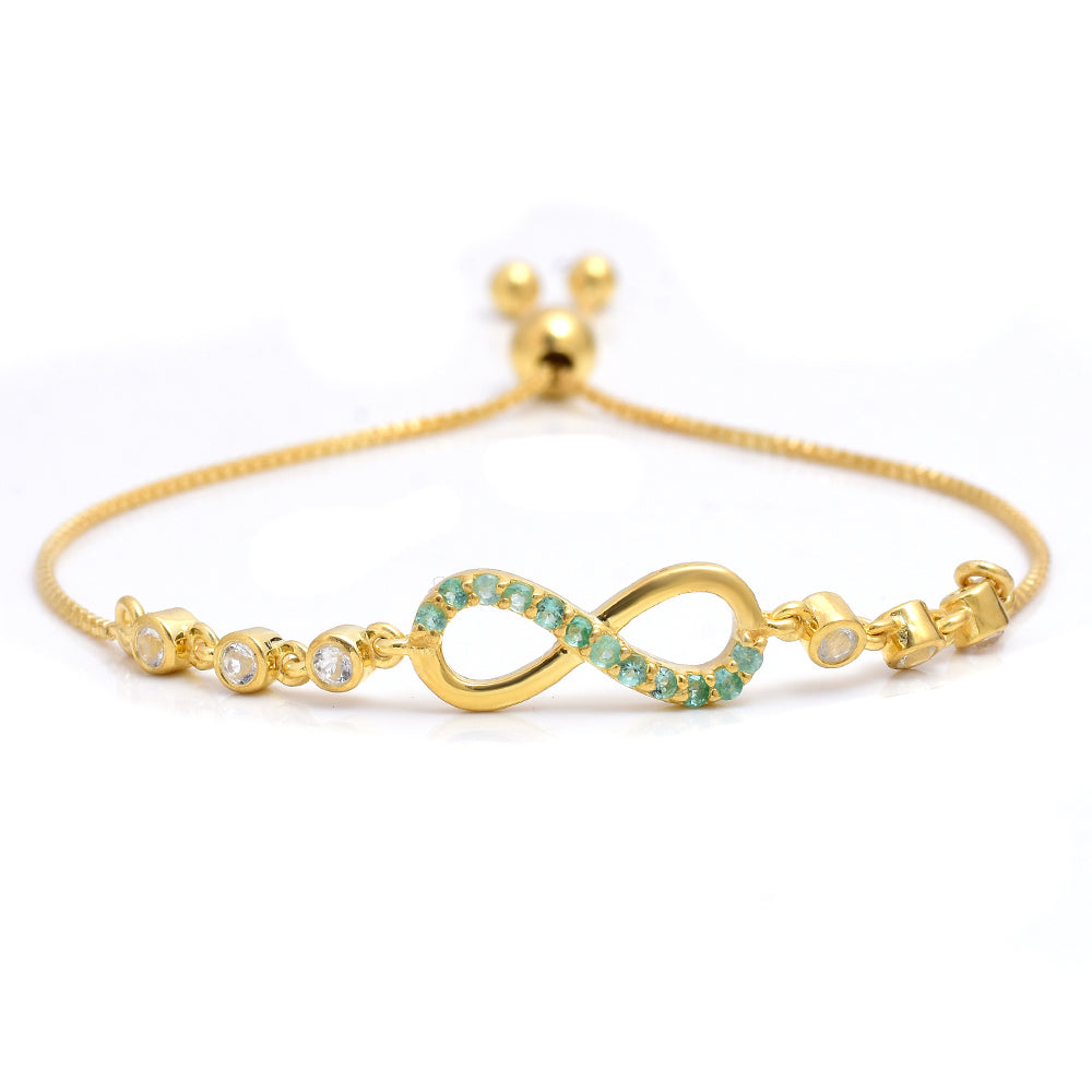 Goldplattiertes Silberarmband mit brasilianischem Smaragd und weißem Topas