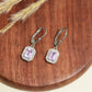 Silberohrringe mit brasilianischem Amethyst und weißem Topas