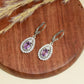 Silberohrringe mit brasilianischem Amethyst und weißem Topas