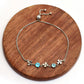 Silberarmband mit madagassischem blauem Apatit und weißem Topas