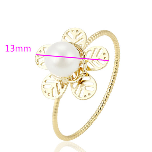 Ring aus goldplattierterr Legierung mit Glasperle
