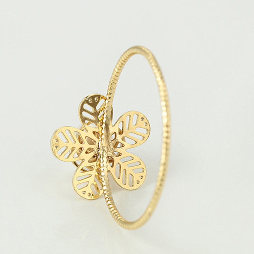 Ring aus goldplattierterr Legierung mit Glasperle