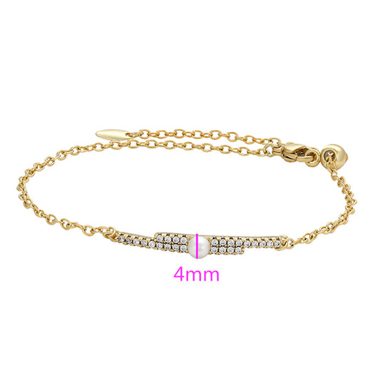 Armband aus goldplattiertesr Legierung mit Glasperle und weißem Emporia® Kristall