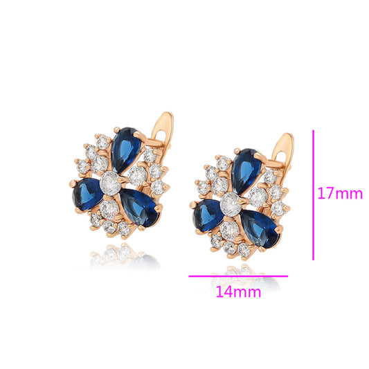 Ohrringe aus goldplattierter Legierung mit blauem Emporia®-Kristall und weißem Emporia® Kristall