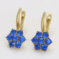 Ohrringe aus goldplattierter Legierung mit blauem Emporia®-Kristall