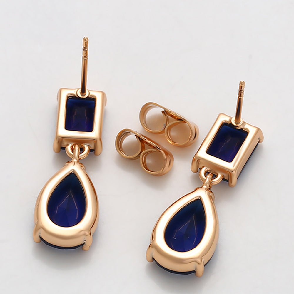 Ohrringe aus goldplattierter Legierung mit blauem Emporia®-Kristall 4 