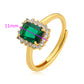 Ring aus goldplattierterr Legierung mit grünem Emporia® Kristall und weißem Emporia® Kristall