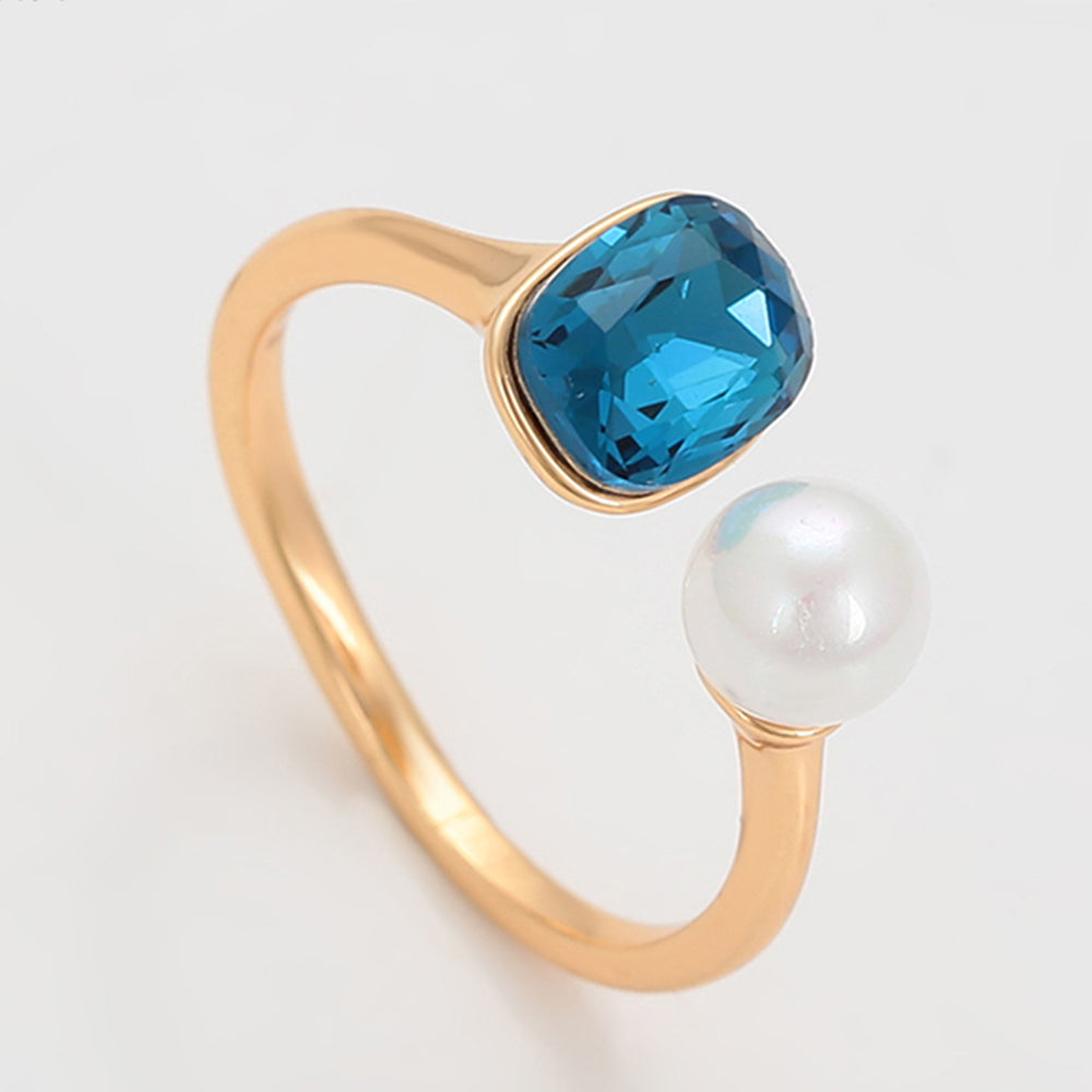 Ring aus goldplattierterr Legierung mit Glasperle und blauem Emporia®-Kristall 3 