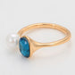 Ring aus goldplattierterr Legierung mit Glasperle und blauem Emporia®-Kristall