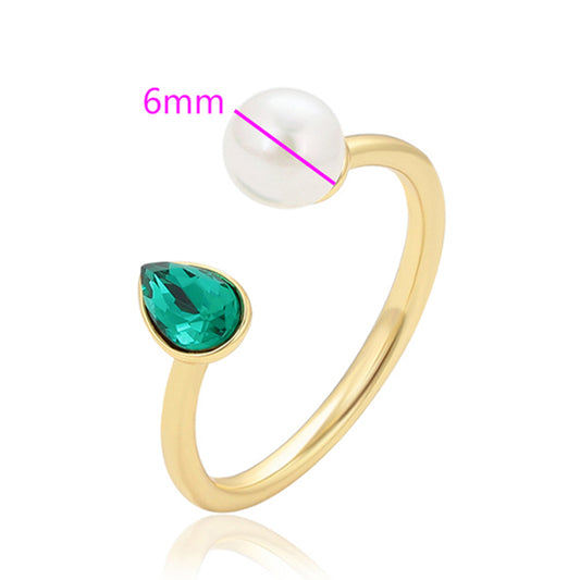 Ring aus goldplattierterr Legierung mit Glasperle und grünem Emporia® Kristall