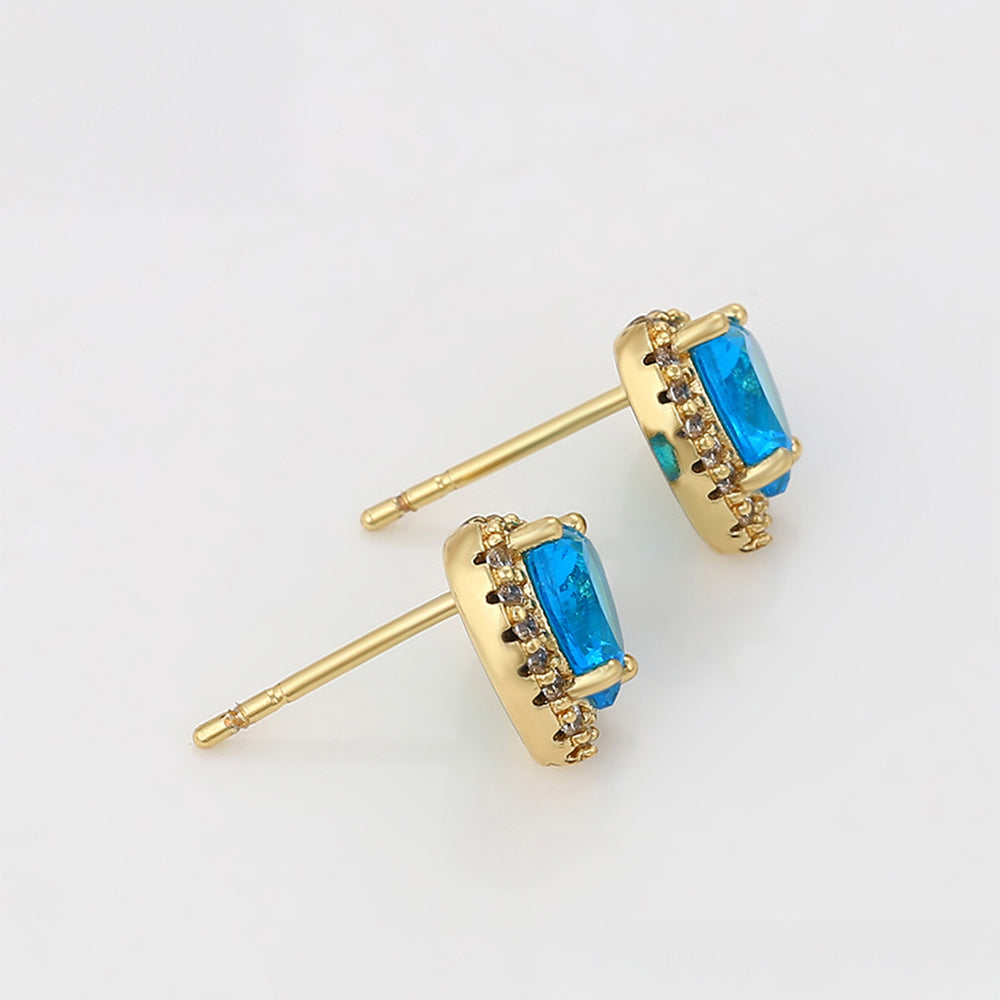 Ohrringe aus goldplattierter Legierung mit blauem Emporia®-Kristall