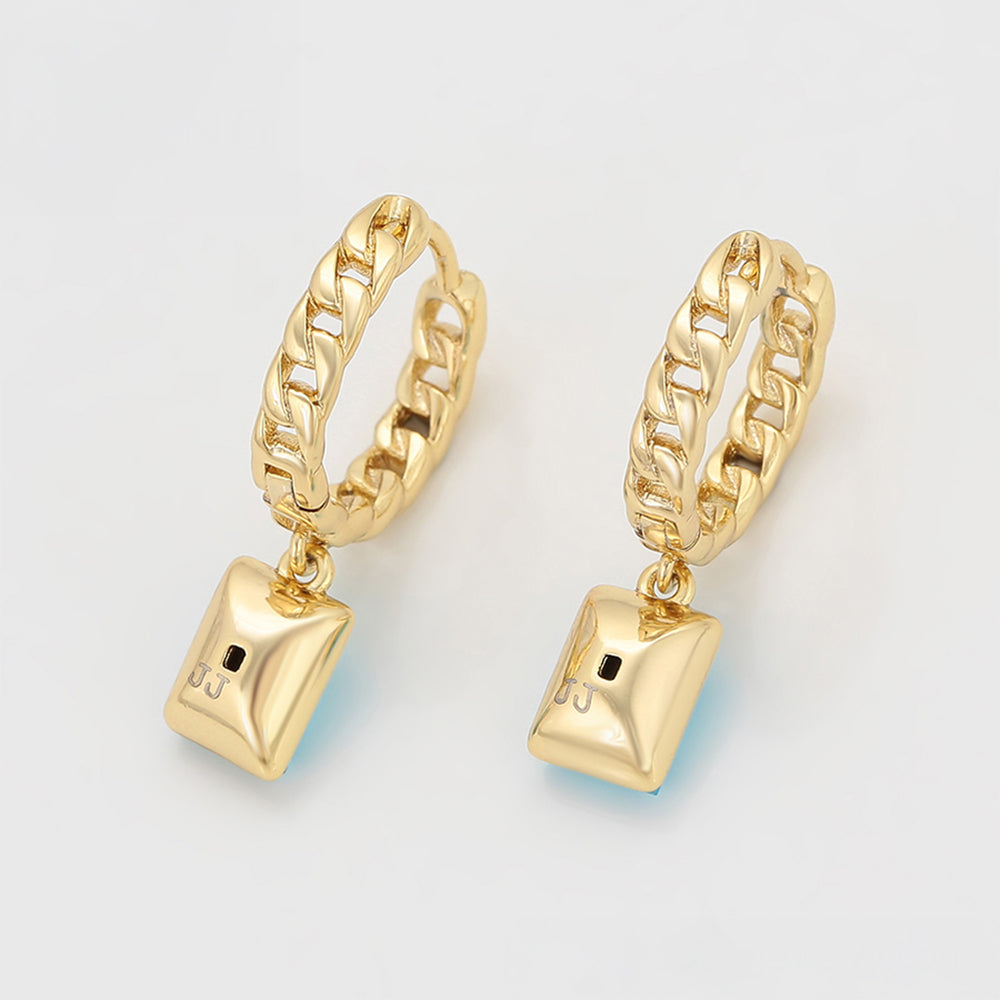 Ohrringe aus goldplattierter Legierung mit blauem Emporia®-Kristall
