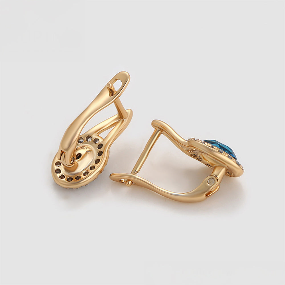 Ohrringe aus goldplattierter Legierung mit blauem Emporia®-Kristall und weißem Emporia® Kristall