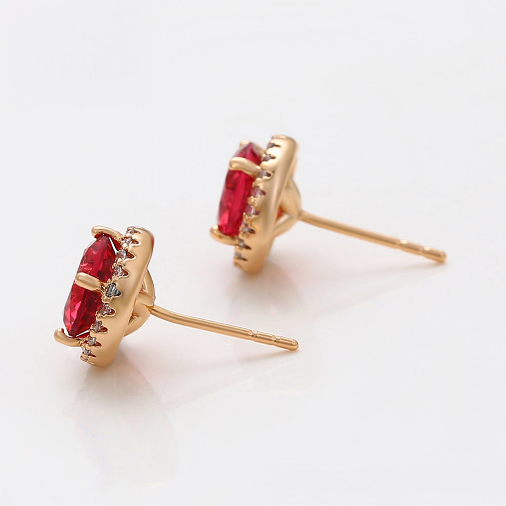 Ohrringe aus goldplattierter Legierung mit rotem Emporia®-Kristall und weißem Emporia® Kristall