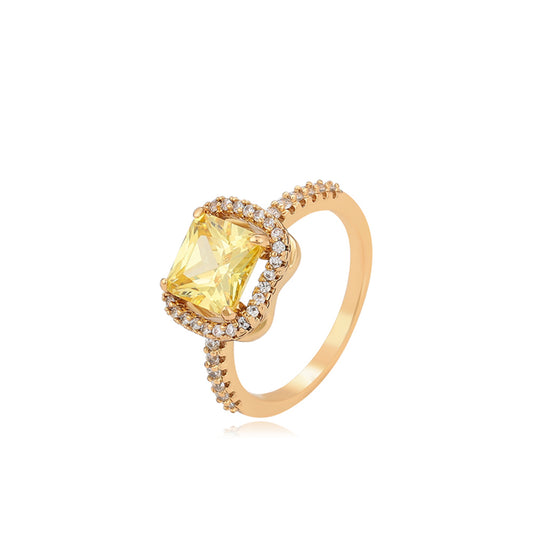 Ring aus goldplattierterr Legierung mit gelbem Emporia®-Kristall und weißem Emporia® Kristall