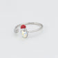 Ring aus goldplattierterr Legierung mit rotem Emporia®-Kristall und weißem Emporia® Kristall