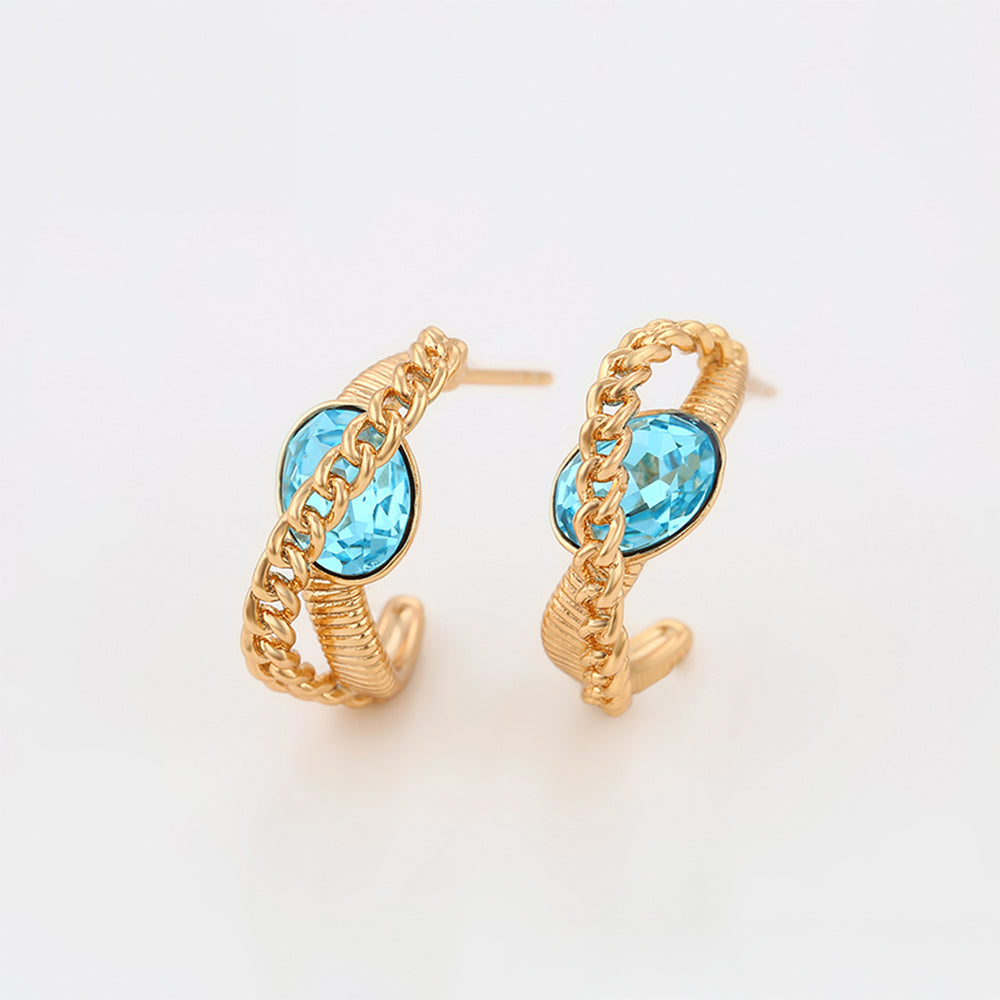 Ohrringe aus goldplattierter Legierung mit blauem Emporia®-Kristall