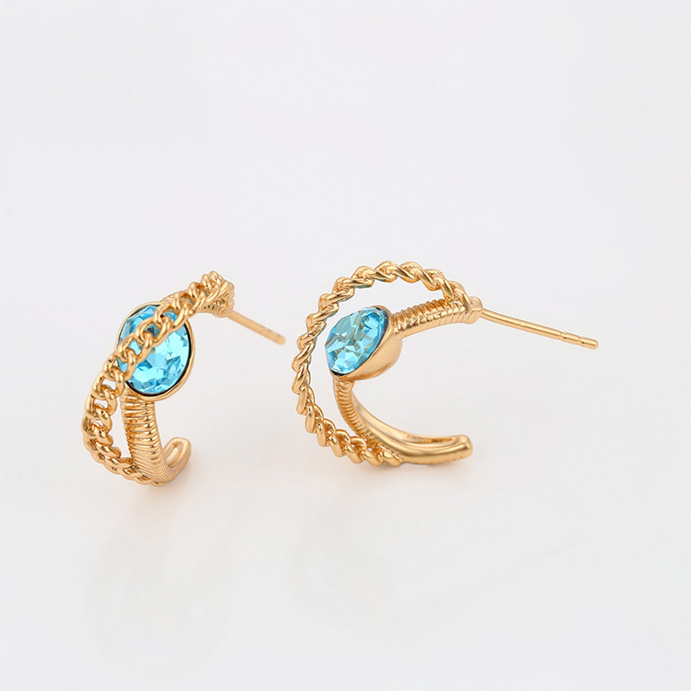 Ohrringe aus goldplattierter Legierung mit blauem Emporia®-Kristall 5 
