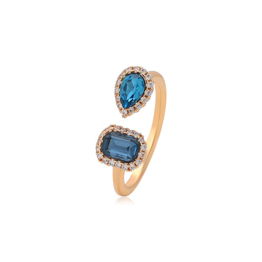 Ring aus goldplattierterr Legierung mit blauem Emporia®-Kristall und weißem Emporia® Kristall