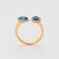 Ring aus goldplattierterr Legierung mit blauem Emporia®-Kristall und weißem Emporia® Kristall