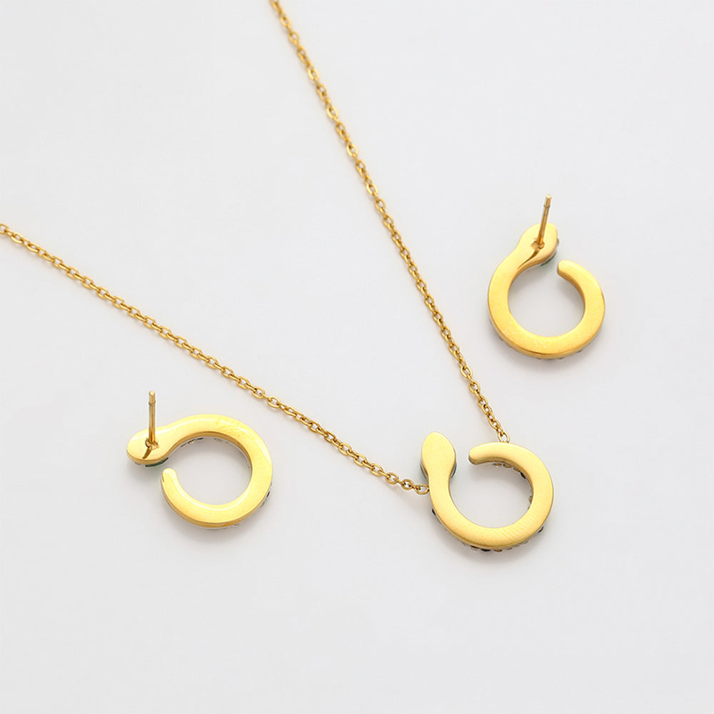 Schmuckgarnitur aus aus goldplattierter Legierung mit grünem Emporia® Kristall und weißem Emporia® Kristall 11 