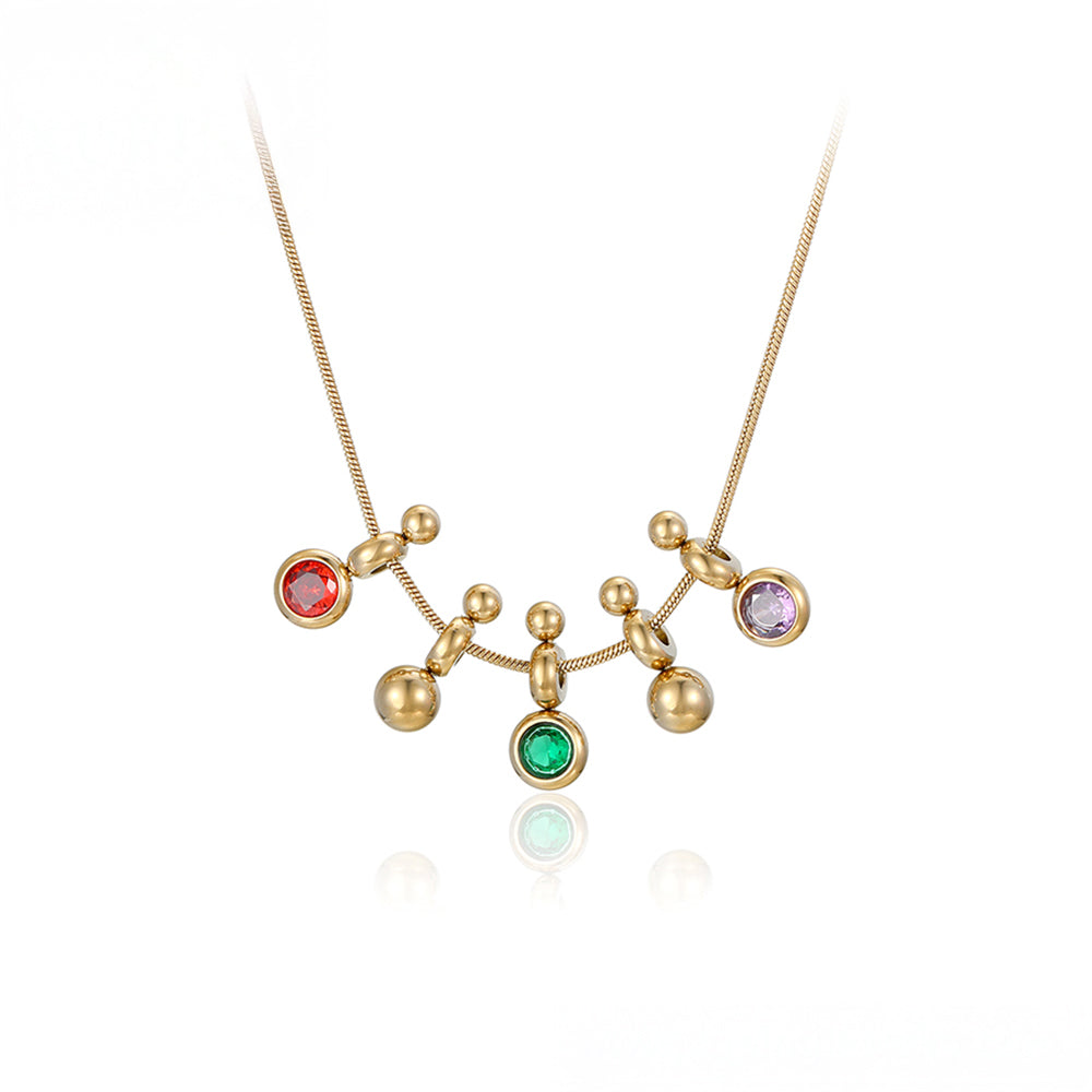 Halskette aus goldplattierter Legierung mit grünem Emporia® Kristall und rotem Emporia®-Kristall 2 