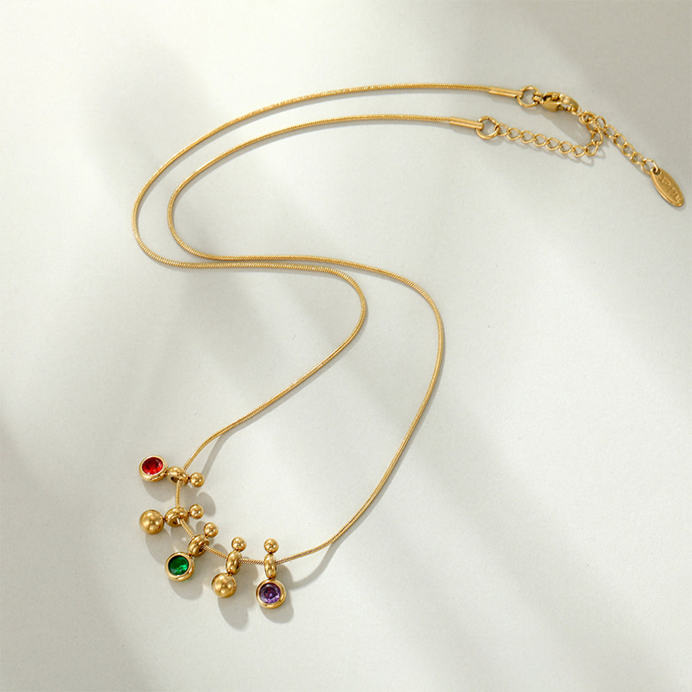 Halskette aus goldplattierter Legierung mit grünem Emporia® Kristall und rotem Emporia®-Kristall 6 