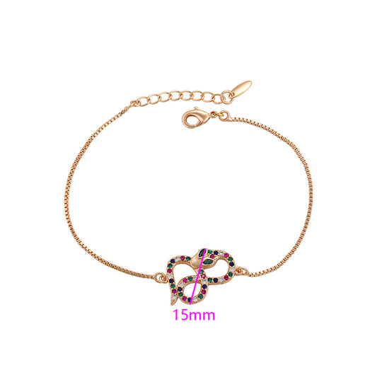 Armband aus goldplattiertesr Legierung mit rotem Emporia®-Kristall und grünem Emporia® Kristall