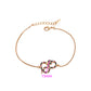 Armband aus goldplattiertesr Legierung mit rotem Emporia®-Kristall und grünem Emporia® Kristall