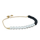 Goldplattiertes Silberarmband mit Obsidian und weißer Süßwasserperle