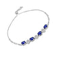 Silberarmband mit australischem blauem Saphir und weißem Topas