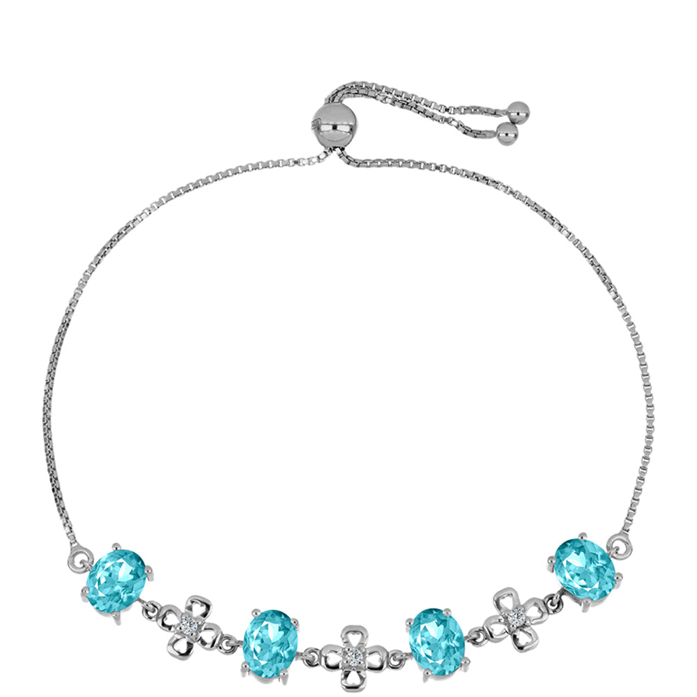 Silberarmband mit Paraiba Quarz und weißem Topas