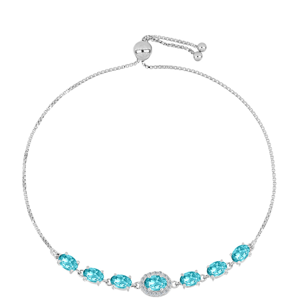 Silberarmband mit Paraiba Quarz und weißem Topas