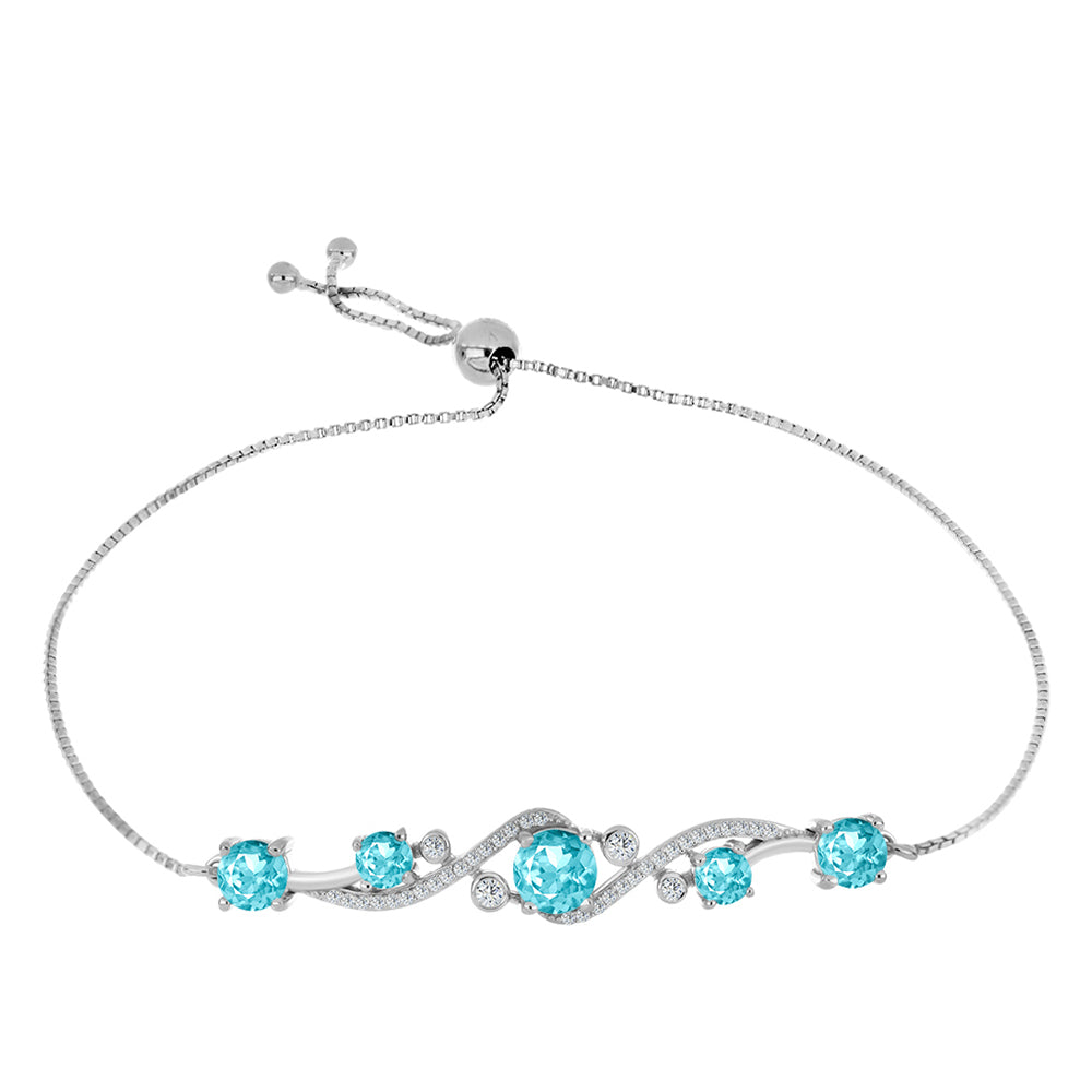 Silberarmband mit Paraiba Quarz und weißem Topas