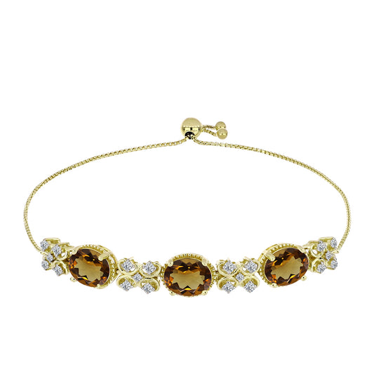 Goldplattiertes Silberarmband mit Cognac-Quarz und weißem Topas