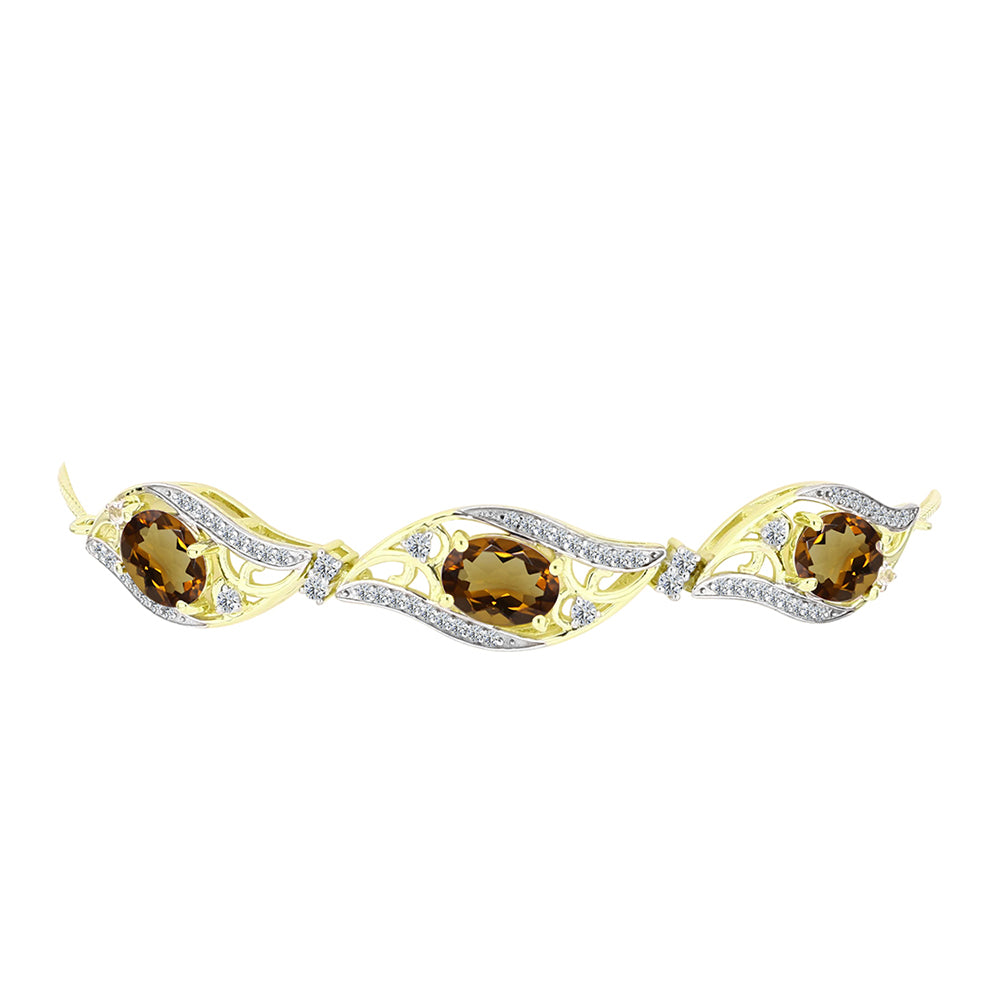 Goldplattiertes Silberarmband mit Cognac-Quarz und weißem Topas