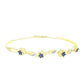 Goldplattierter Silberarmreif mit blauem Diamant und weißem Topas