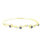 Goldplattierter Silberarmreif mit blauem Diamant und weißem Topas