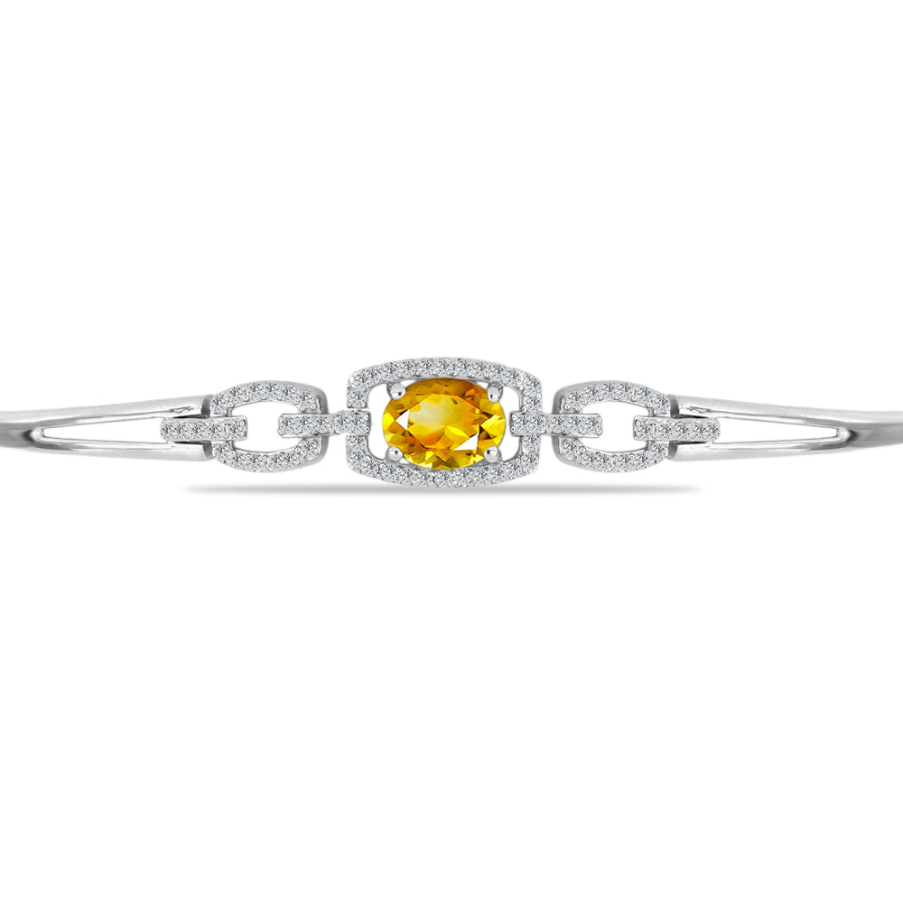 Silberarmband mit goldfarbenem Rio Zitrin und weißem Topas