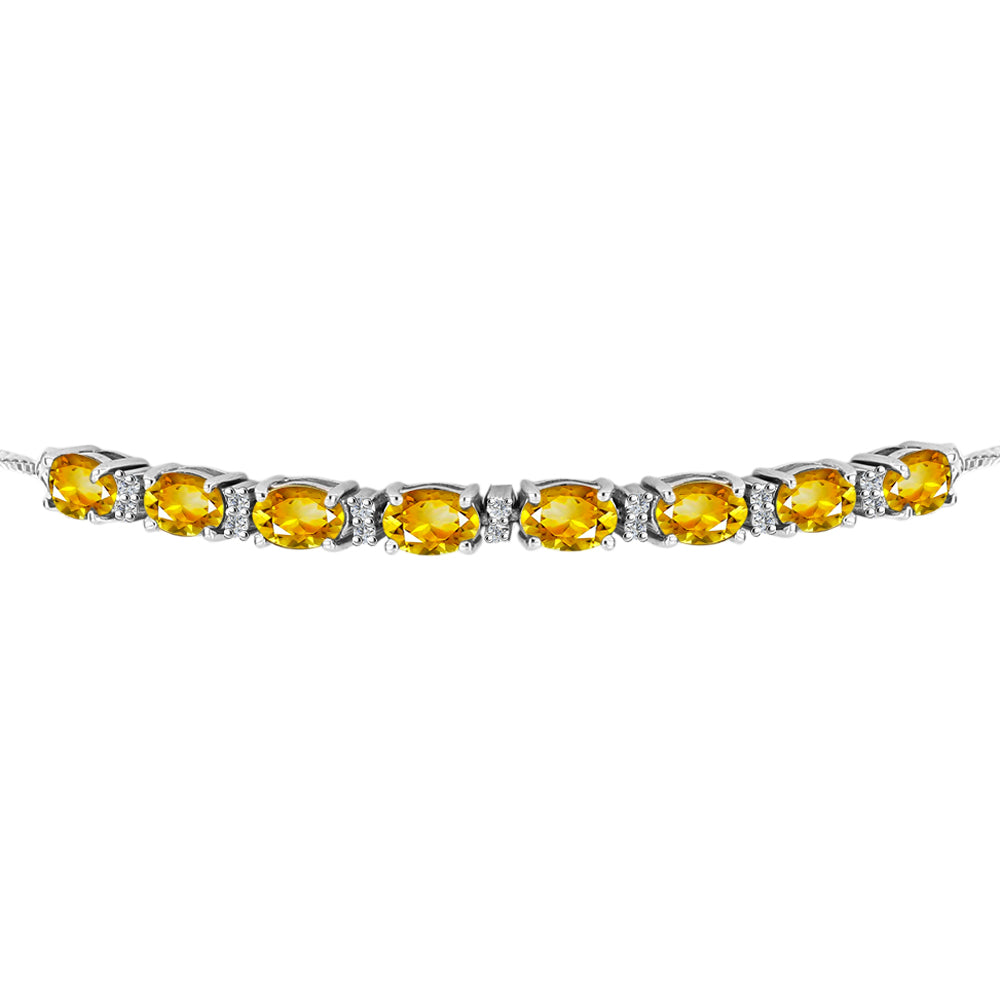 Silberarmband mit goldfarbenem Rio Zitrin und weißem Topas