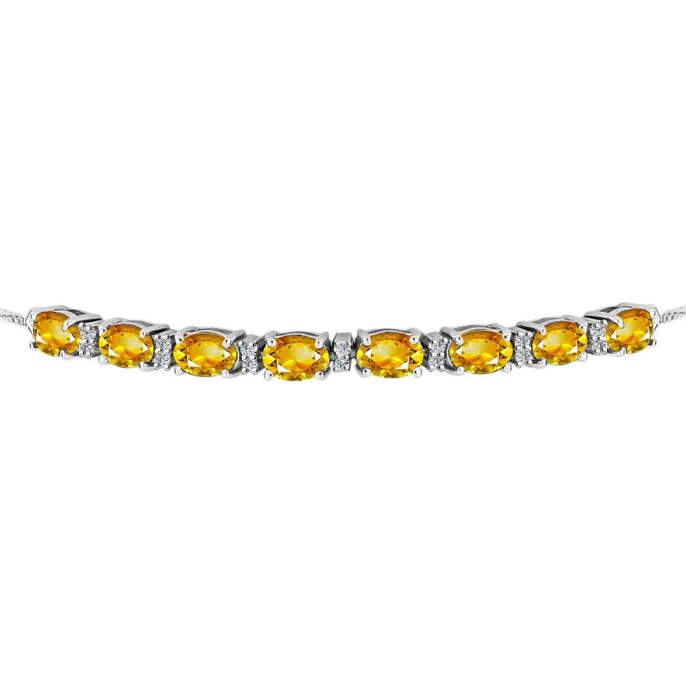 Silberarmband mit goldfarbenem Rio Zitrin und weißem Topas