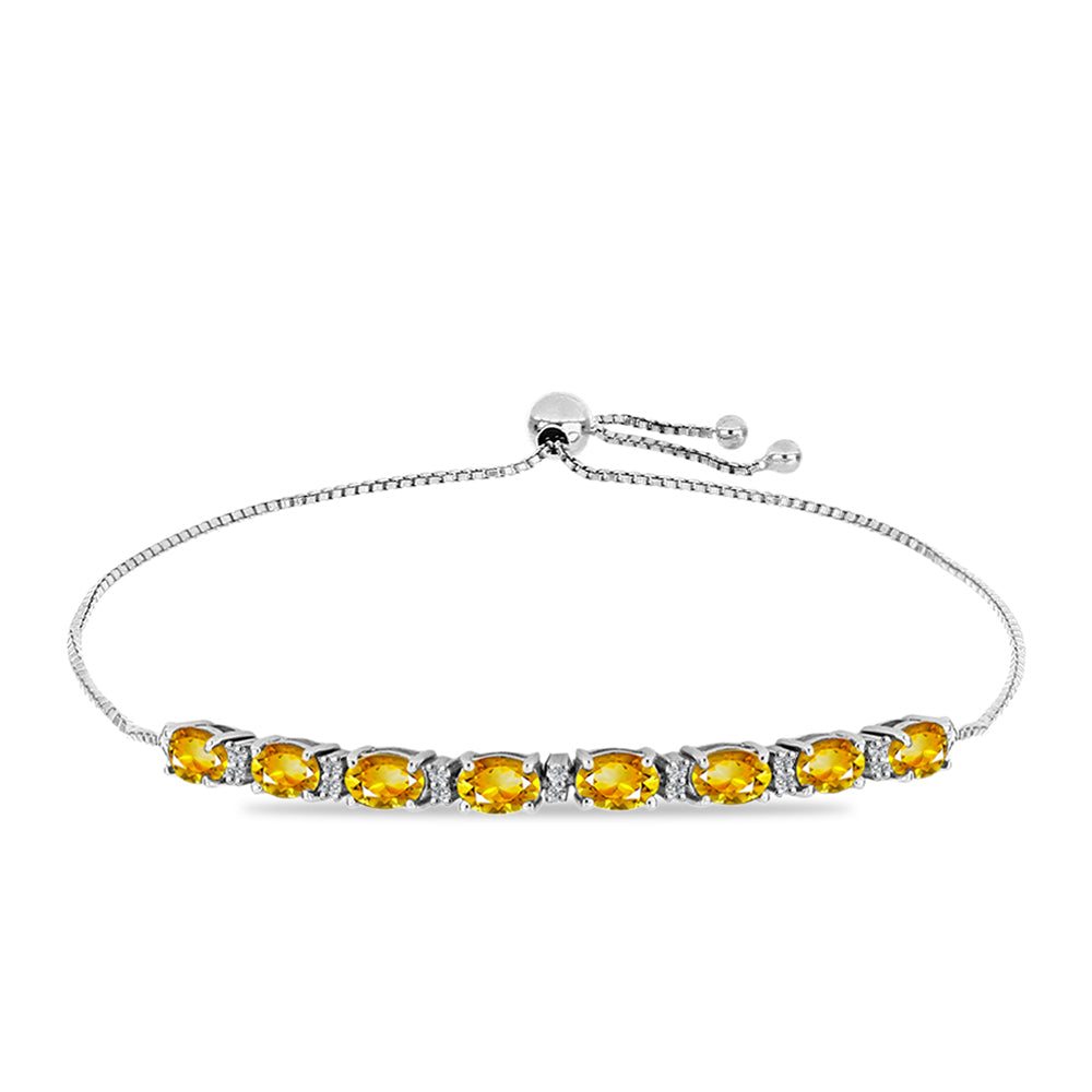 Silberarmband mit goldfarbenem Rio Zitrin und weißem Topas 4 