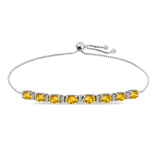 Silberarmband mit goldfarbenem Rio Zitrin und weißem Topas