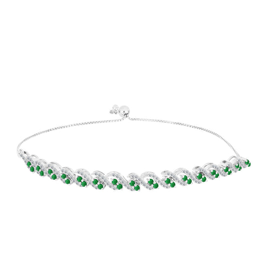 Silberarmband mit sambischem Smaragd und weißem Topas