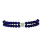 Goldplattiertes Silberarmband mit schwarzer Süßwasserperle und weißem Topas