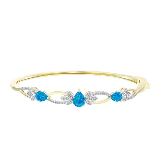 Goldplattierter Silberarmreif mit äthiopischem Paraiba-Blauopal und weißem Topas