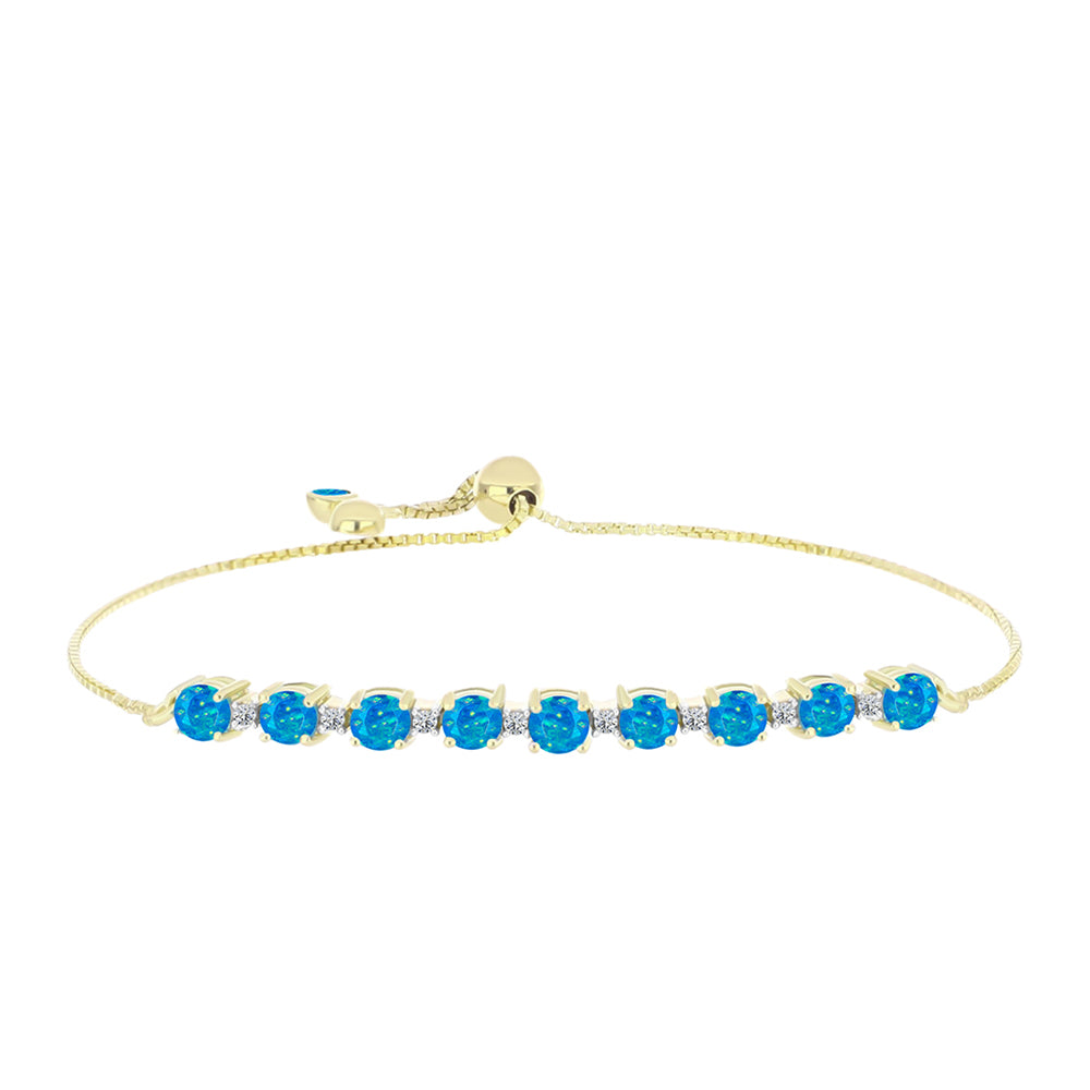 Goldplattiertes Silberarmband mit äthiopischem Paraiba-Blauopal und weißem Topas
