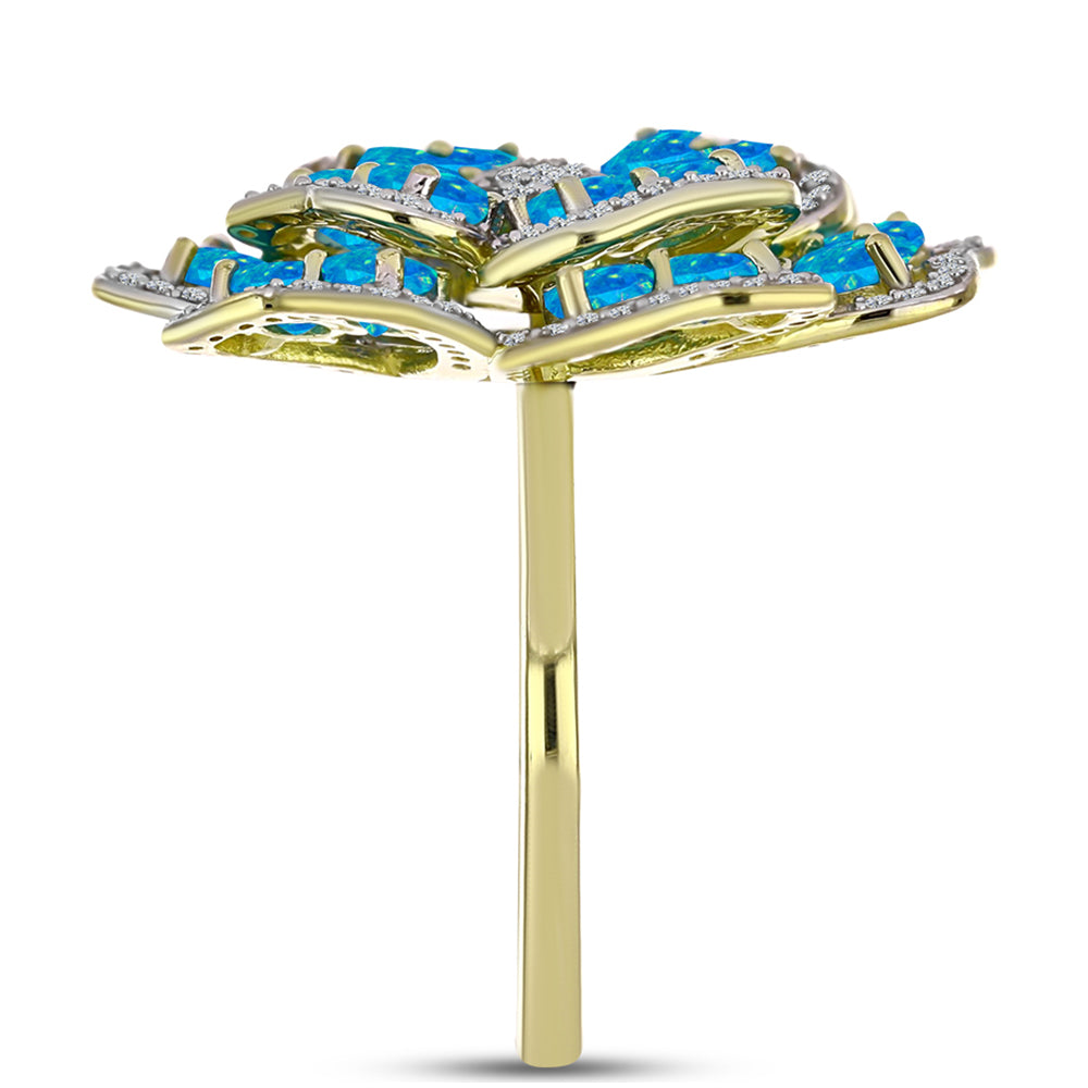 Goldplattierter Silberring mit äthiopischem Paraiba-Blauopal und weißem Topas