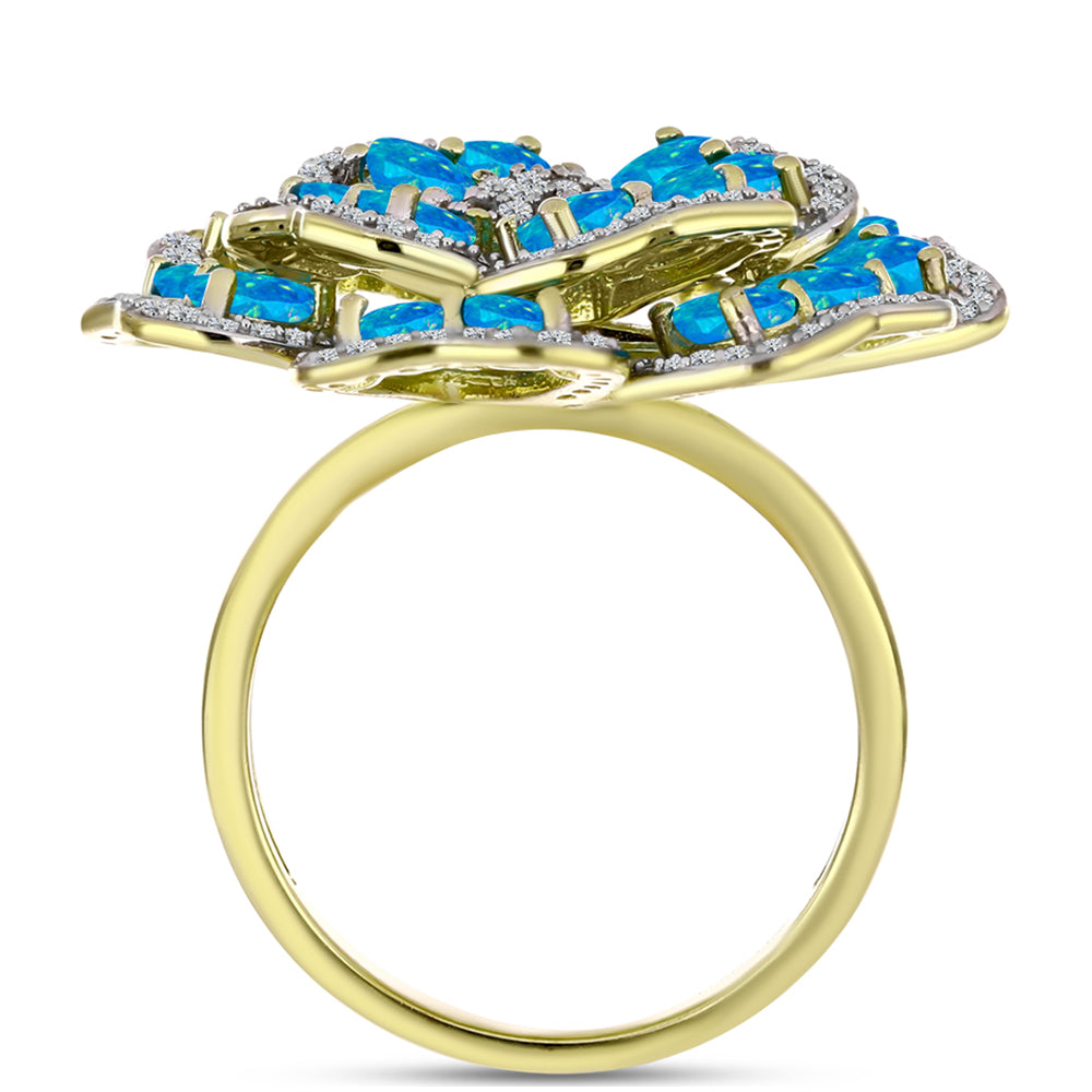 Goldplattierter Silberring mit äthiopischem Paraiba-Blauopal und weißem Topas